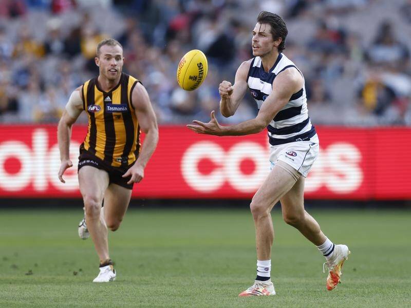 Geelong's Isaac Smith was booed but came out on top in his first clash with former team Hawthorn.