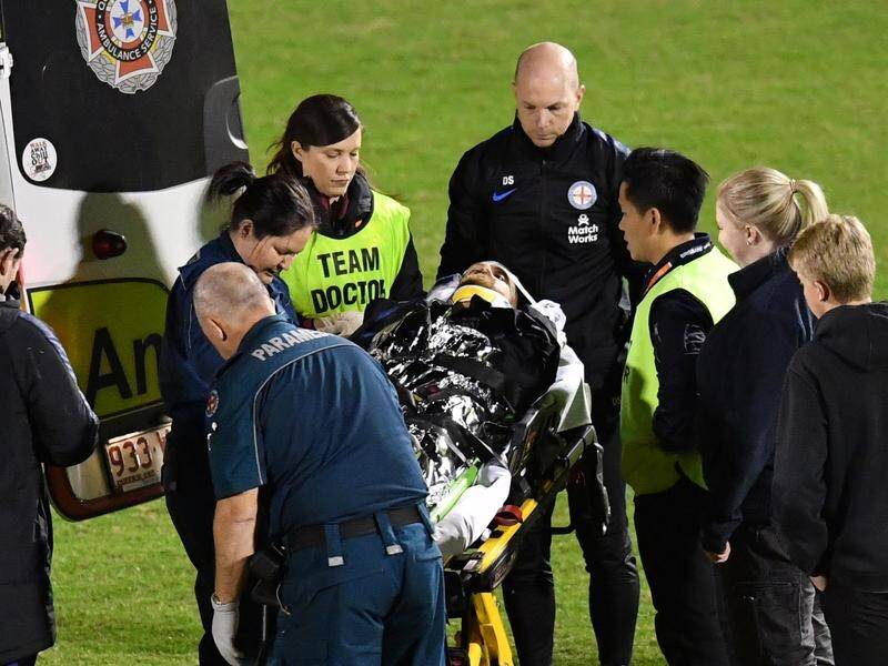 Melbourne City's Luke Brattan left the field in an ambulance during a Brisbane FFA Cup match.