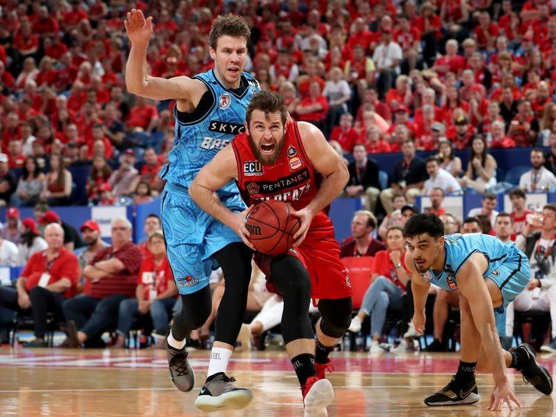 Perth want a more-aggressive Mitch Norton (C) as Damian Martin's injury replacement in the NBL.