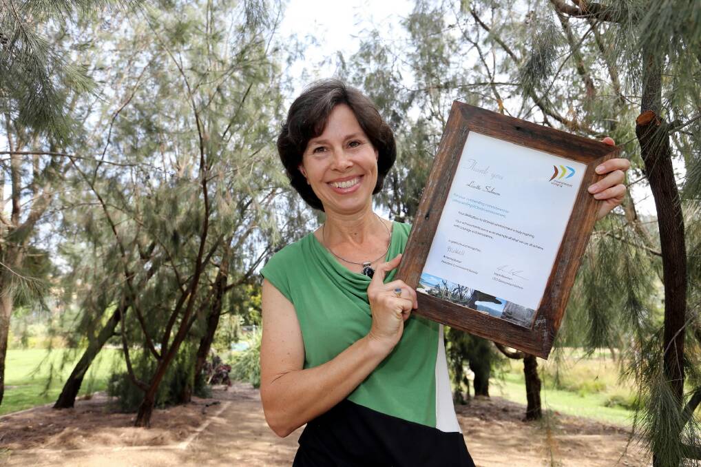 Lizette Salmon with her Community Environmental Recognition Award. Picture: PETER MERKESTEYN