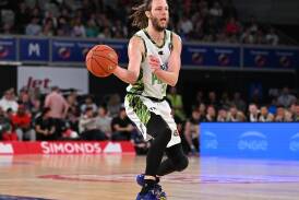 A knee injury to Craig Moller has soured the SEM Phoenix's 90-79 NBL win over the NZ Breakers. (James Ross/AAP PHOTOS)