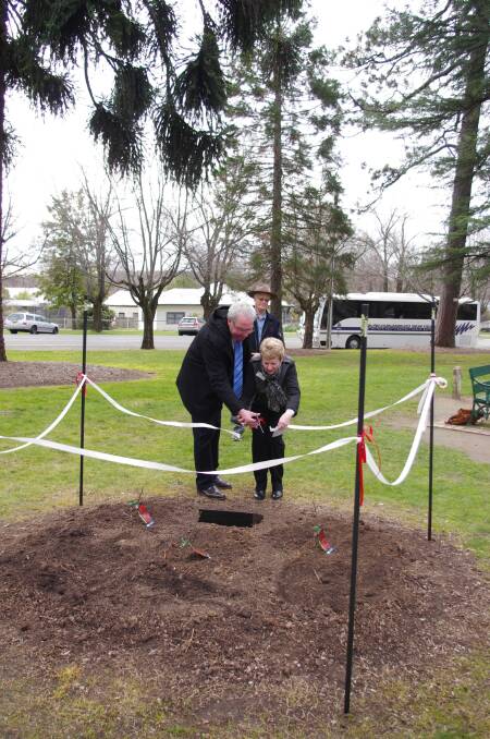 Bernard Gaffney and Julia Smith unveil a new garden for the Red Cross centenary. Picture: INDIGO COUNCIL
