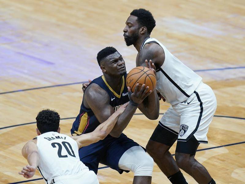 A late blunder from New Orleans forward Zion Williamson (c) cost the Pelicans against Brooklyn.