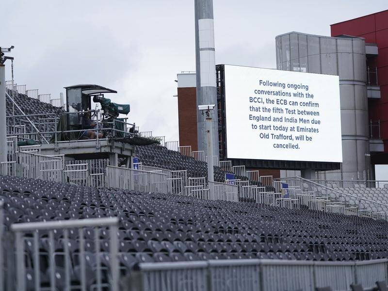 A message on the big screen at Old Trafford tells the bad news of the fifth Test cancellation.