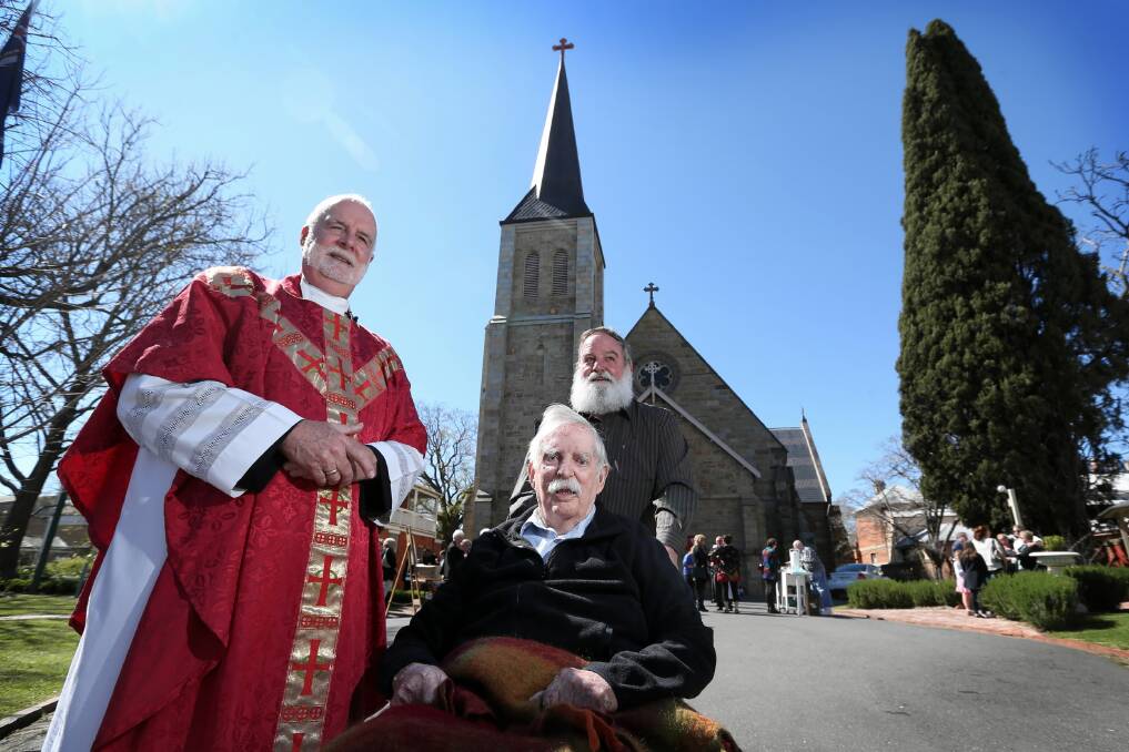 John Davis, Maurice Chick and Alan Chick marked the 20th anniversary of the St Matthew’s Church rebuild. Dr Davis said yesterday he never doubted the church would rise from the ashes. Picture: MATTHEW SMITHWICK