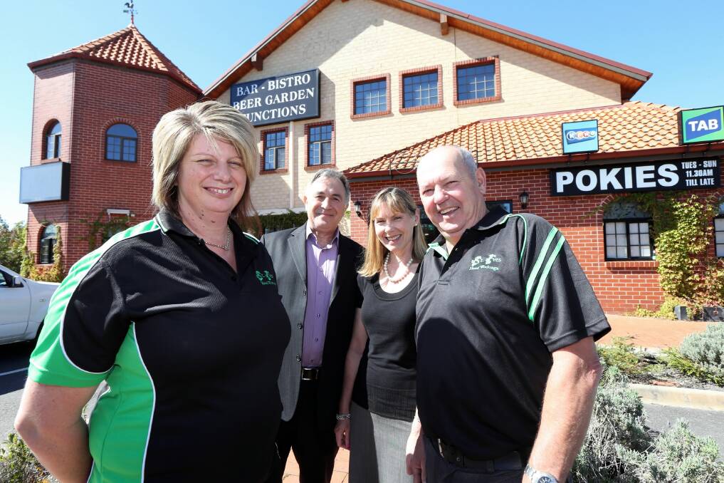 St Ives Biere Cafe owners Ray and Margaret Seit, centre, welcome the new management team of Jo and Herb Stratton, who have taken over running the establishment on the Lincoln Causeway, Wodonga. Picture: PETER MERKESTEYN