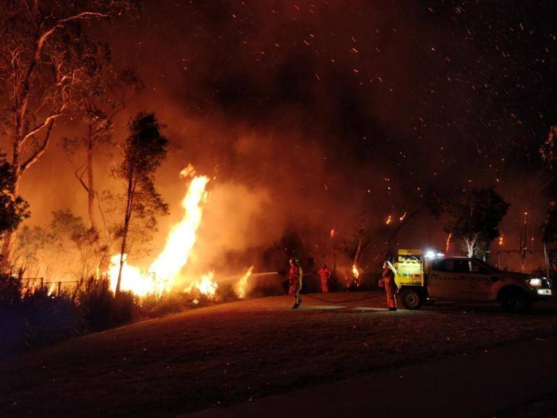 Three teens have been questioned about a fire which destroyed two homes on the Sunshine Coast.