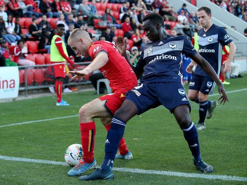 Thomas Deng (R) has left Melbourne Victory to play for Japanese club Urawa Red Diamonds.