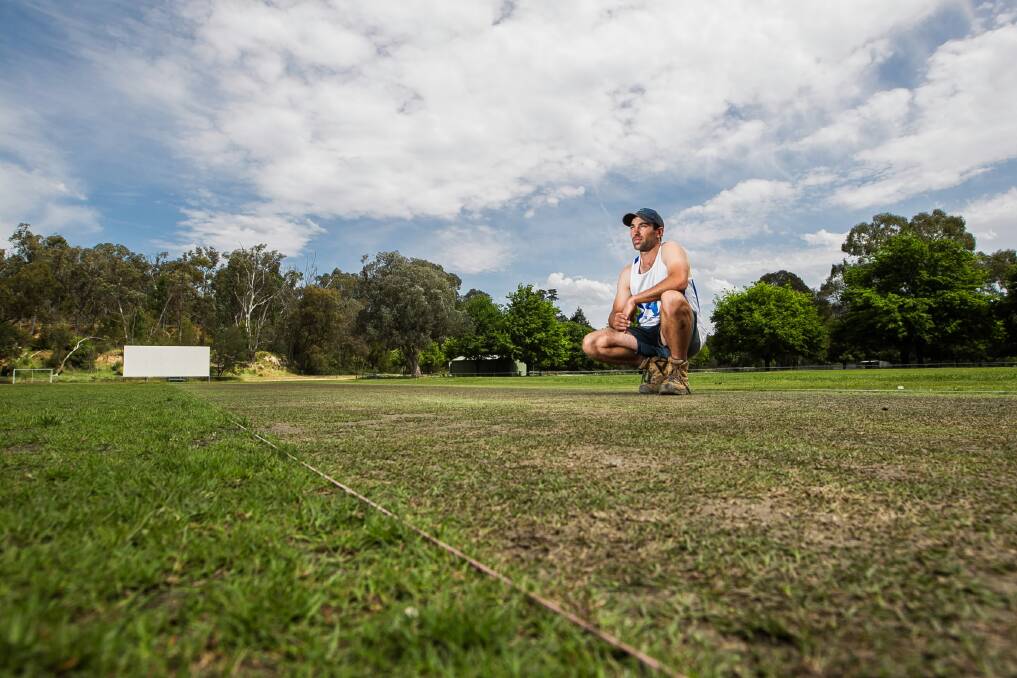 Mick Walker inspects the pitch at Yackandandah ahead of the opening day’s play in the grand final rematch with Eskdale. Picture: DYLAN ROBINSON