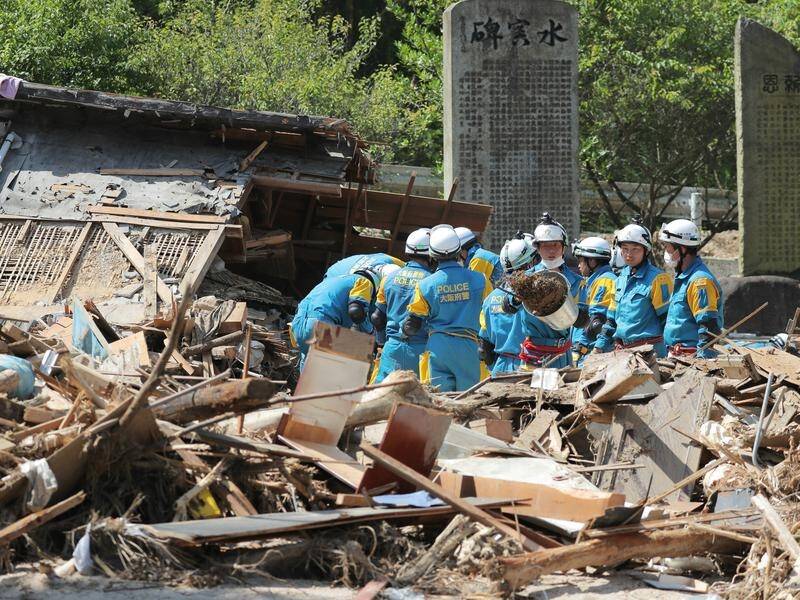 Rescuers continue to search for the missing after downpours sparked massive floods in Japan.