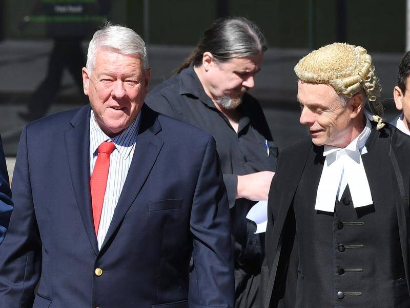John Wagner (left) and brothers Denis, Neill and Joe are suing the Nine Network for defamation.