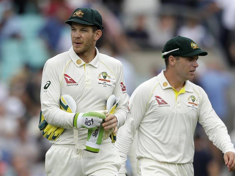 Australia captain Tim Paine (l) opted to bowl first on day one of the fifth Ashes Test at the Oval.