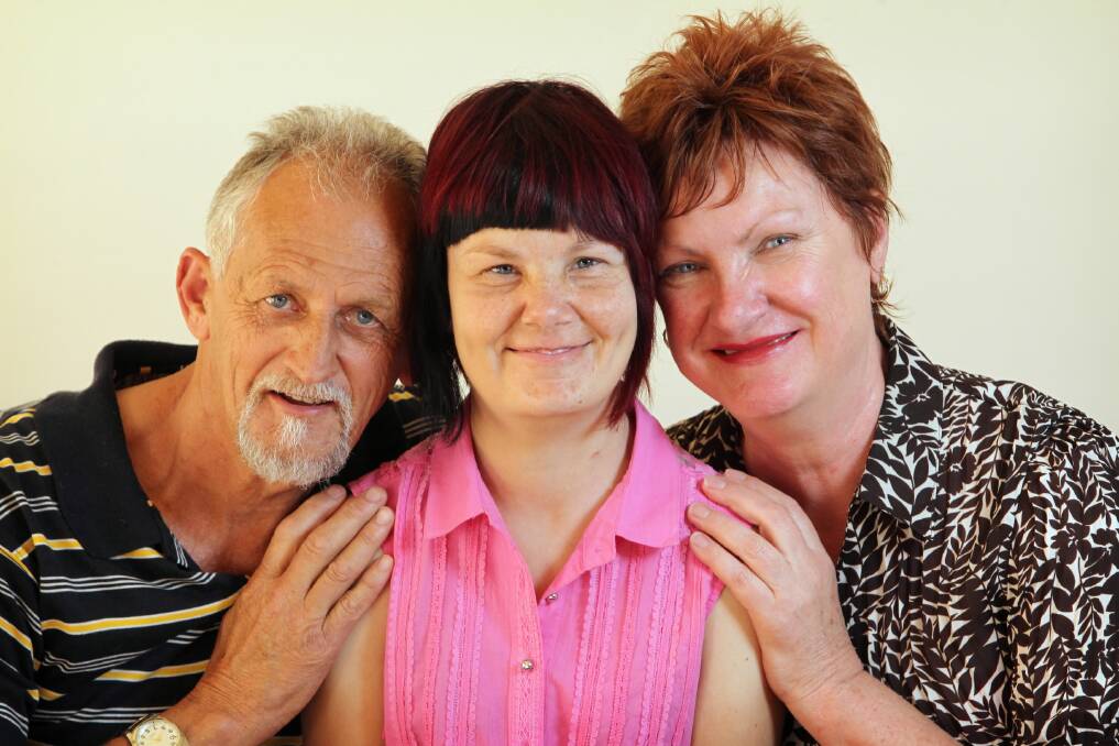 Barry and Rose Hawkins, with daughter Faye. The family is set for Faye’s second kidney transplant. Picture: MATTHEW SMITHWICK
