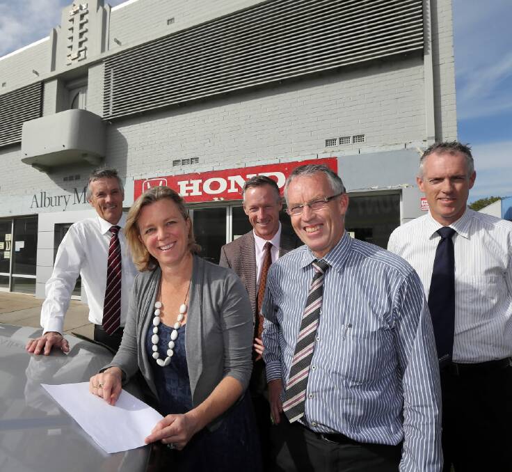 LEFT: Hume sales and marketing general manager Melissa Sweetland, with Baker brothers Martin, David, Stuart and Simon. Picture: PETER MERKESTEYN