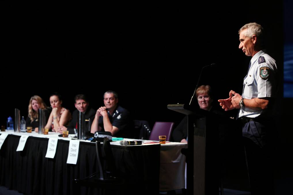 Annette Walton, Carmen Colley, Alan Fisher, Inspector Tony Davis and Heather Webster listen as Inspector David Cottee addresses the forum at The Cube, Wodonga. Picture: MATTHEW SMITHWICK