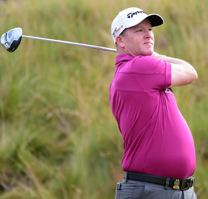 Marcus Fraser watches his tee shot on the sixth hole during his round of 71. Picture: GETTY IMAGES