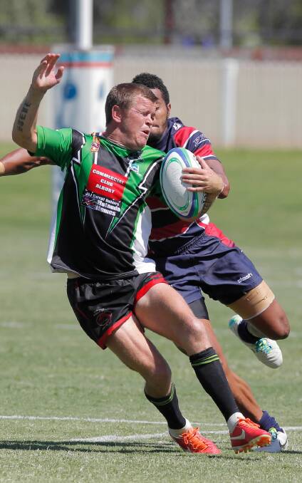 Thunder fullback Ben Jeffery evades a tackle in the Rugby 10s at Albury Sportsground this month.