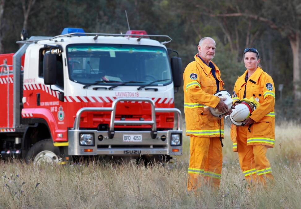 Lavington Brigade deputy captain Bob Kuhne and firefighter Tamara Dixon are ready for trouble. Picture: KYLIE ESLER