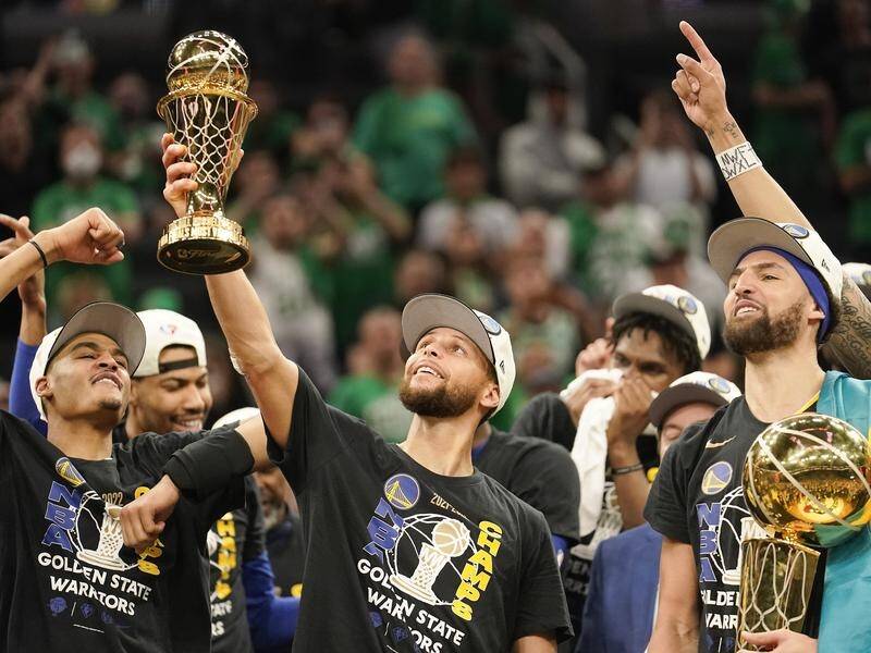 Warriors' Steph Curry (centre) and his NBA champion teammates reckon they're not done yet.