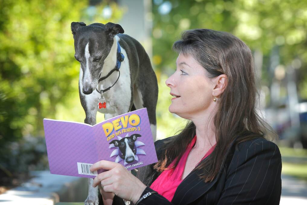 Lavington’s Carolyn Maxwell has written her third children’s book based on her service dog Devo. Picture: TARA GOONAN