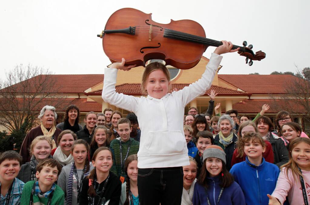 Sounds great to me:The camp’s cello players led by Jacinta Rees, 8, from Sydney, with her trusty instrument.
Picture: KYLIE ESLER