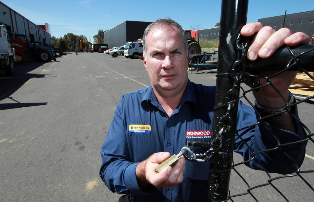 Chain of evidence: Norwood’s Mark Moran shows how out-of-town thieves entered the yard. Picture: KYLIE ESLER