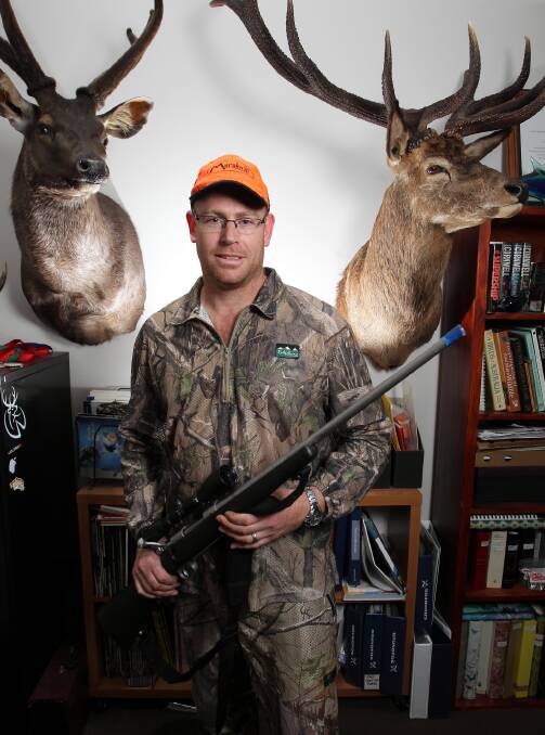 Luke Mitchell displays some deer shooting trophies. Picture: KYLIE ESLER