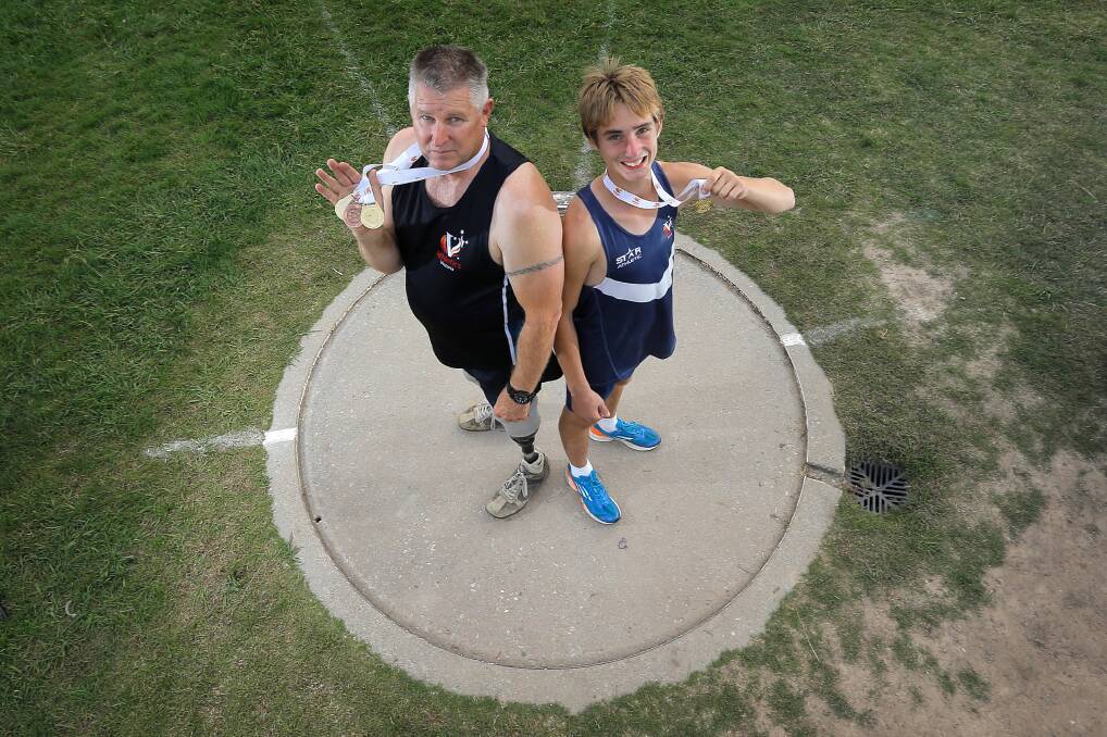 Dennis Ramsay and Jackson Whiley, 13, show off the spoils of their success at Alexandra Park. Picture: TARA GOONAN