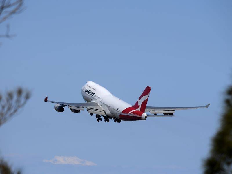 A Qantas 747 has landed in northern WA carrying Australians residents and citizens home from China.