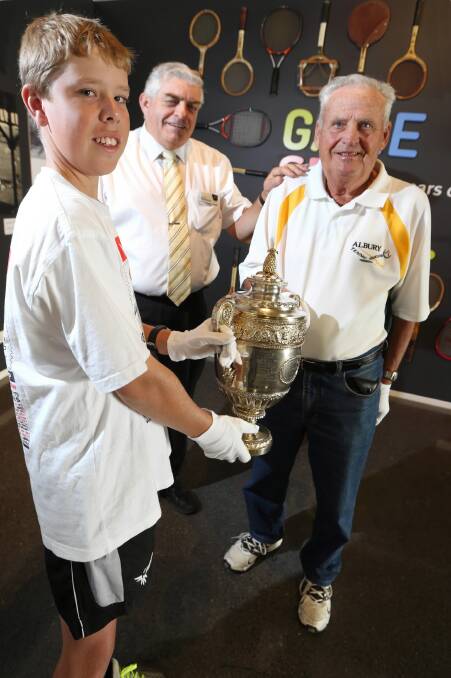 Young tennis star Ash Wurtz, 14, Albury deputy mayor Henk van de Ven and Roy Scholz check out the tennis exhibition. Picture: JOHN RUSSELL