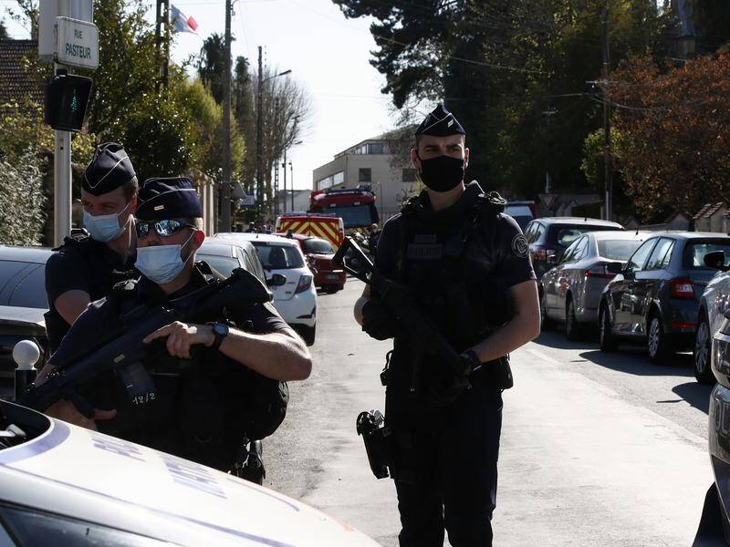 Four people are being questioned in relation to the death of French police official in Rambouillet.