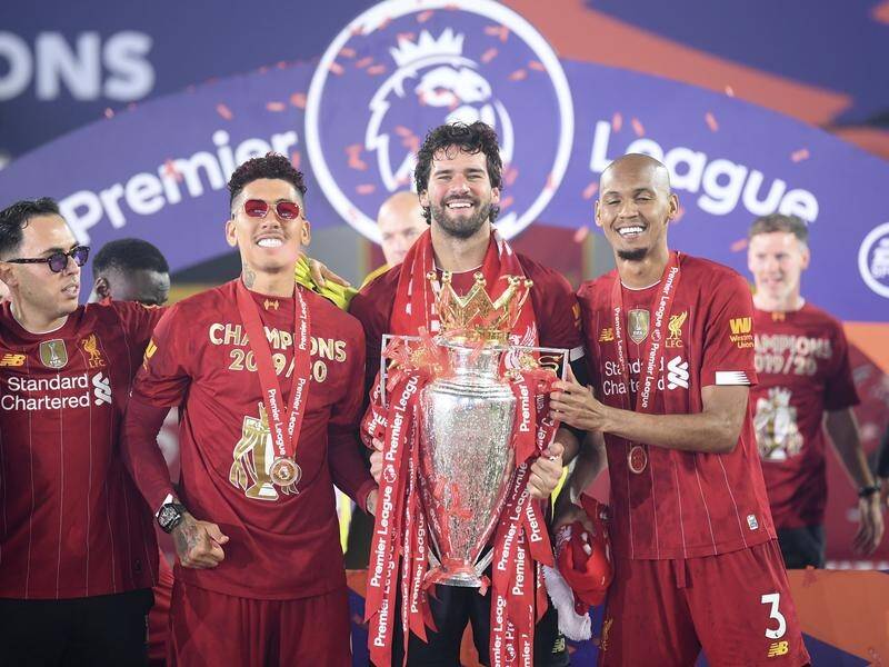 The home of Liverpool's Fabinho (2R) has reportedly been robbed during EPL title celebrations.