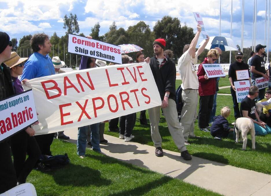 Animal welfare activists outside Australia’s Parliament House in Canberra to protest against the trade of live sheep to the Middle East in 2003.