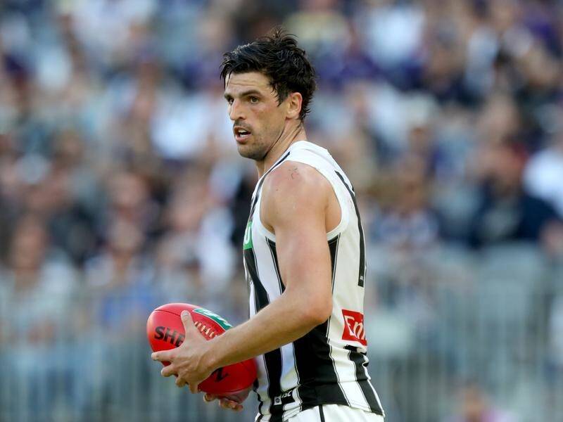 The Magpies' Scott Pendlebury is unsure of the merits of trying to subdue the Tigers' Dustin Martin