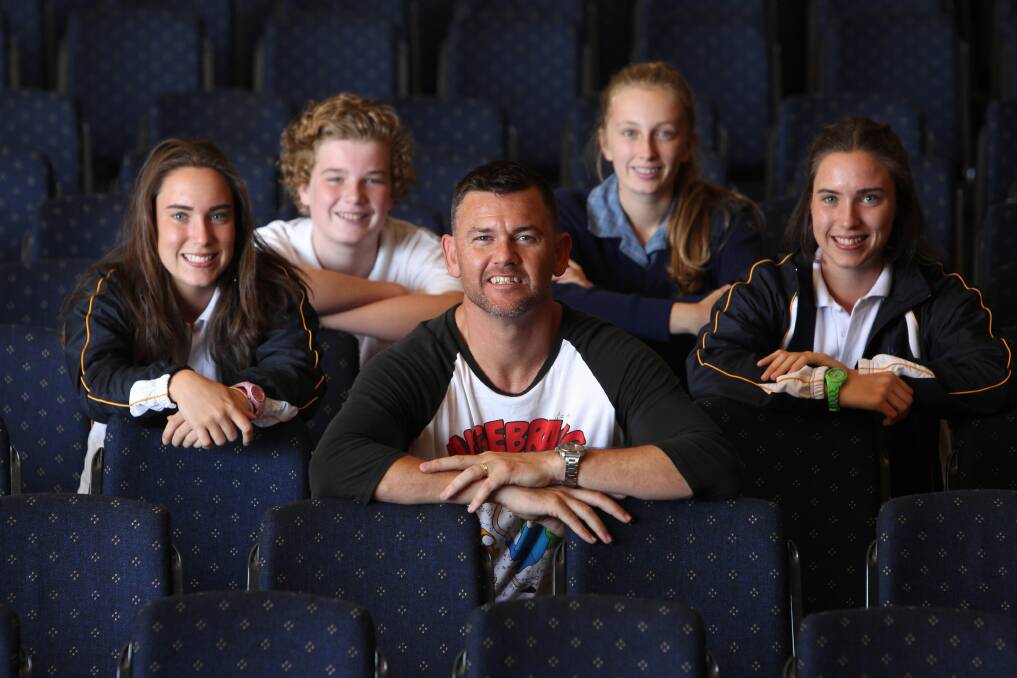 Shai Allan, 14, Liam Williams, 13, Brett Murray, Emily Twycross, 15, and Lily Allan, 14, at Catholic College, Wodonga, after Mr Murray spoke to students on bullying. Picture: MATTHEW SMITHWICK
