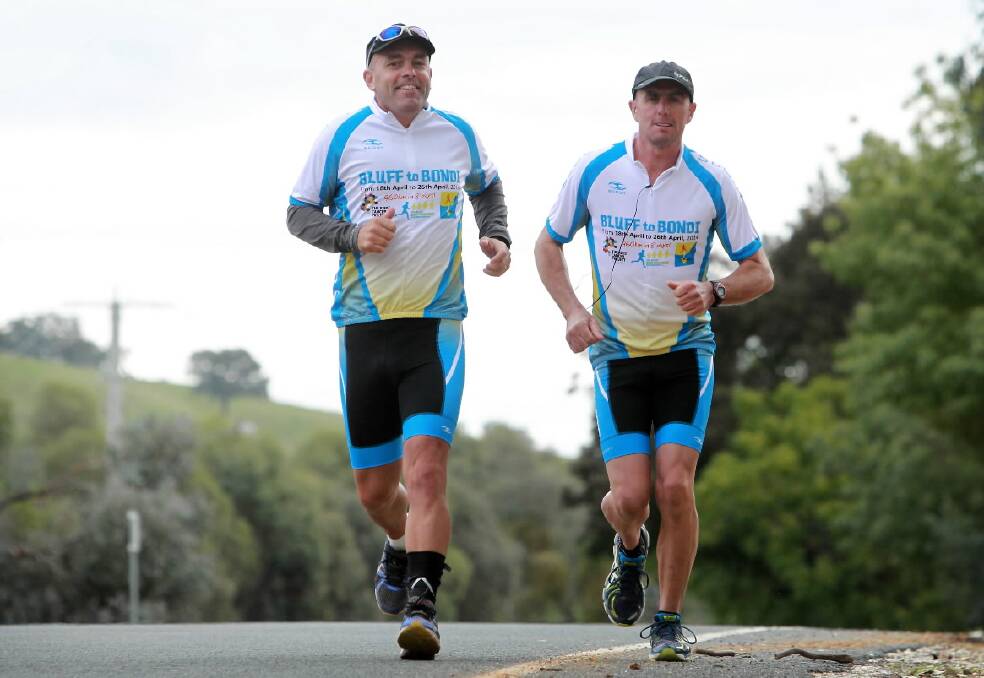 Tim Blair and Shane Taylor arrive in Wodonga during their run to Sydney. Picture: MATTHEW SMITHWICK