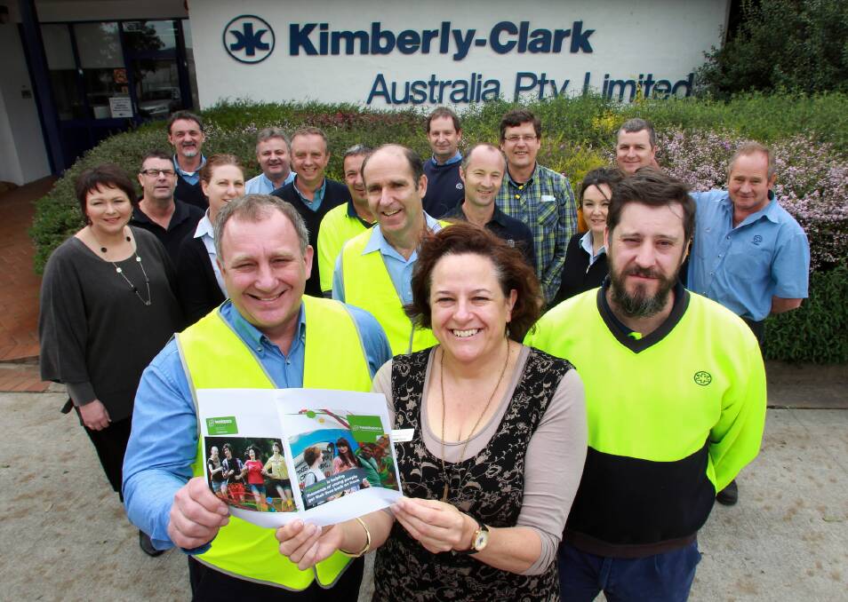 Kimberly-Clark’s Albury mill manager Graham Rodda presented the staff’s donation to Crispin Powis, Loretta Foster and workplace health and safety chairman Sean Watt. Picture: KYLIE ESLER