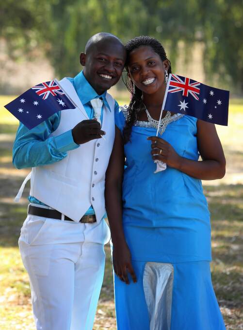 Jean Pierre Malilo became an Australian citizen as his wife Suzan Stanslaus looked on. Picture: MATTHEW SMITHWICK