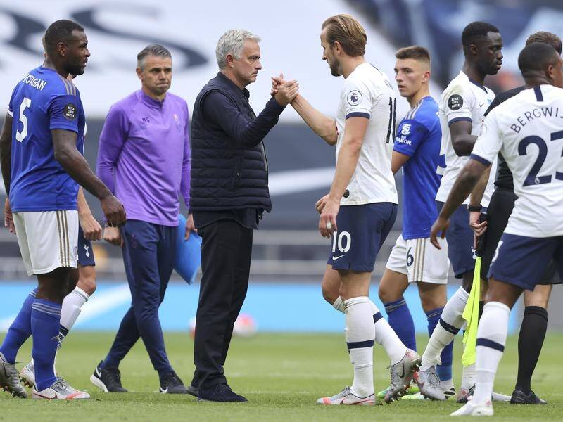 Jose Mourinho and Harry Kane celebrate the 3-0 win over Leicester which took Spurs sixth.