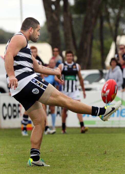 Brendan Fevola kicks one of his nine goals during his day out at Mulwala. Pictures: PETER MERKESTEYN 