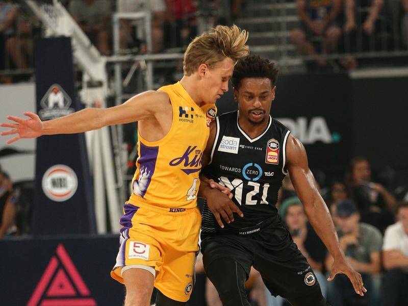 Casper Ware (R) has led Melbourne to a 22-point win over Sydney in game one of their NBL playoffs.