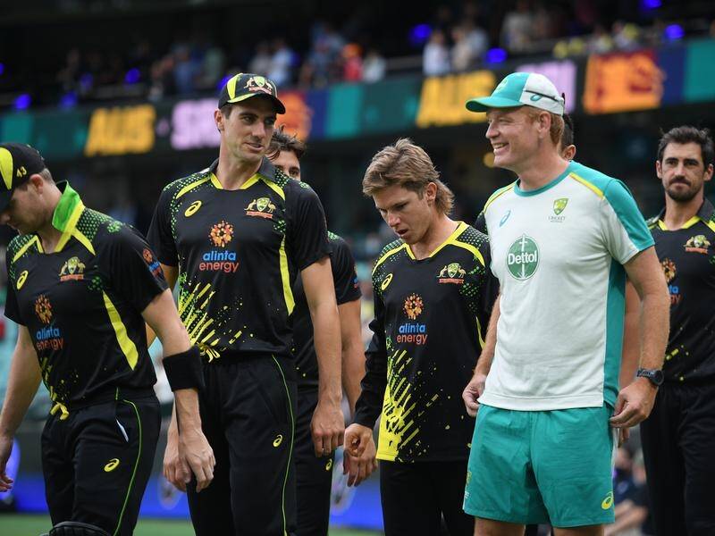 Andrew McDonald (right) has started his interim term as Australian cricket coach with a victory.