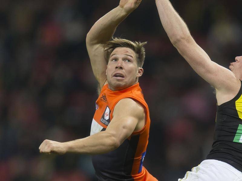GWS star Toby Greene (L) kicked two goals in his comeback to AFL as the Giants upset Richmond.
