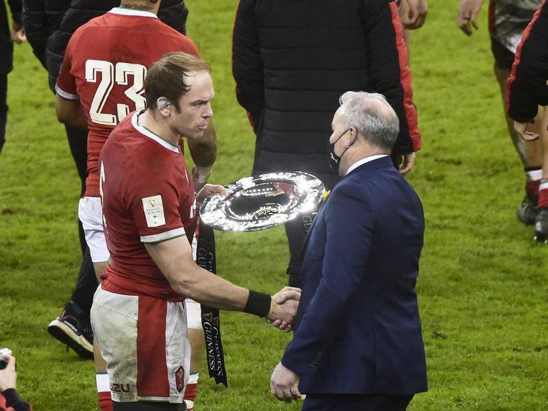 Alun Wyn Jones collected the Triple Crown trophy - but Wales won't talk about the grand slam.