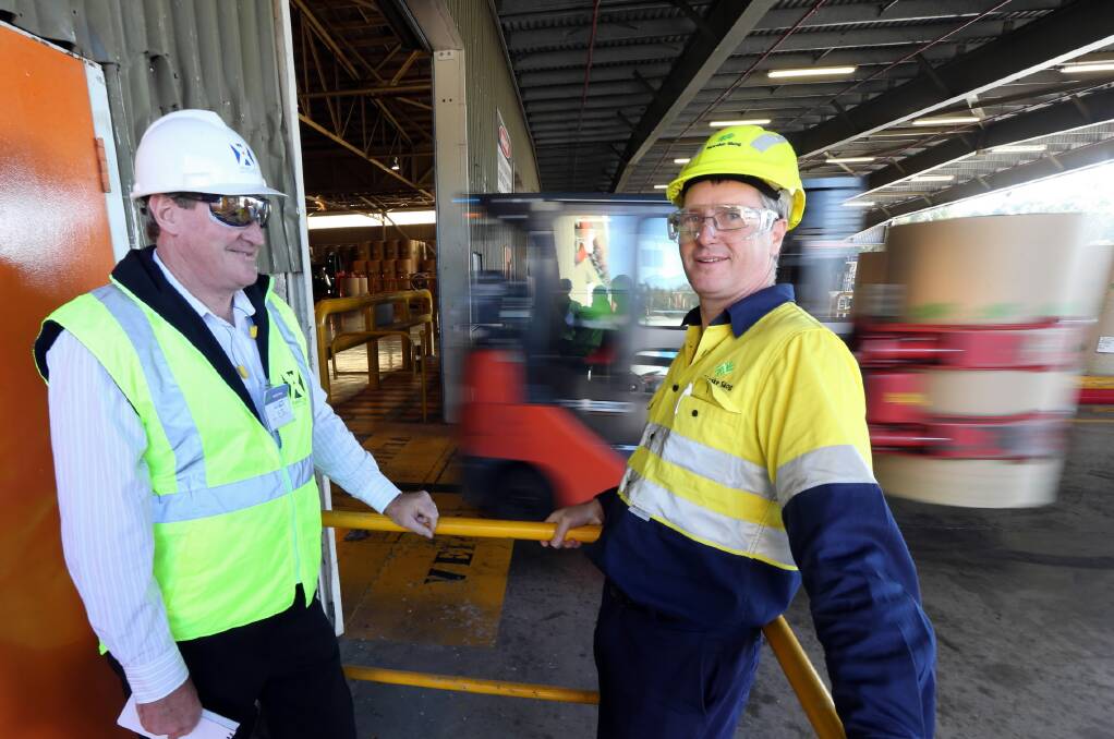 Brett Martin and David Pithers discuss measures to improve forklift safety. Picture: PETER MERKESTEYN