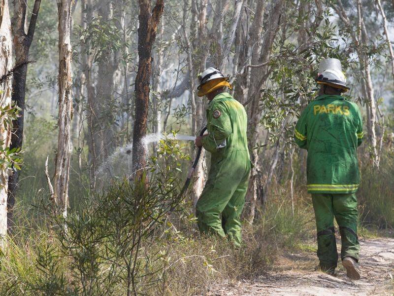 Queensland firefighters have had a brief respite from dangerous bushfire conditions.