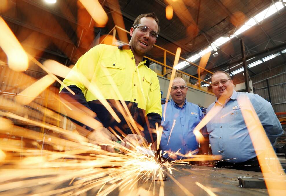 GOTAFE Apprentice of the Year Hayden Rowell with instructors Ralph Scaloz and Greg Keane. Picture: JOHN RUSSELL