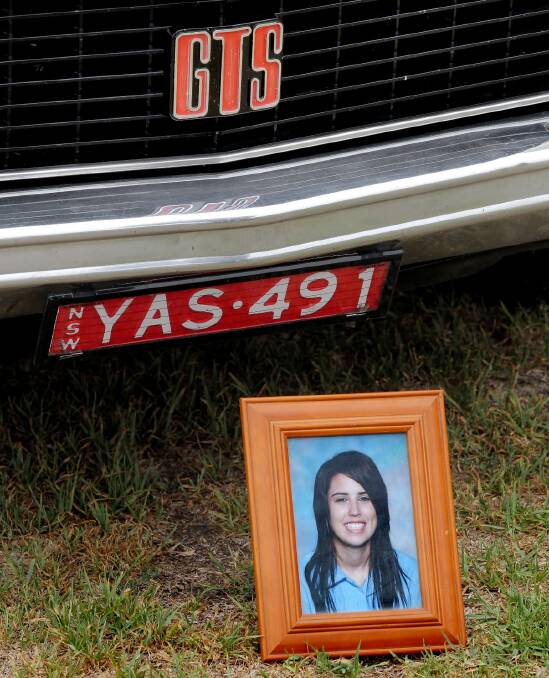 Yasmin Duncan’s photo sits under the car her father Max was rebuilding for her. Pictures: DAVID THORPE