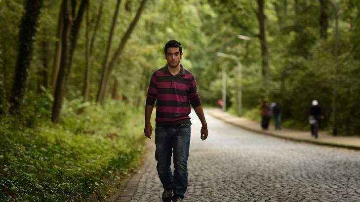 Ali Deeb from Latakia in Syria walks towards the refugee camp he is staying in near Braunschweig, Germany. Ali was one of the 415 people rescued off the Libyan coast by the MY Phoenix Migrant Offshore Aid Station, supported by Medecins Sans Frontieres, on August 26 and taken to Italy. From Italy he made his way to Germany. Photo: Kate Geraghty