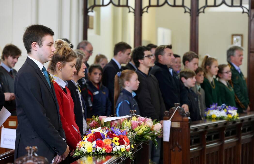 Border residents gathered to mourn the victims of the MH17 plane tragedy. Picture: JOHN RUSSELL